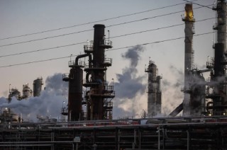 雪佛龙看好委内瑞拉油气潜力，美国两大石油巨头年度利润跌至近年低点